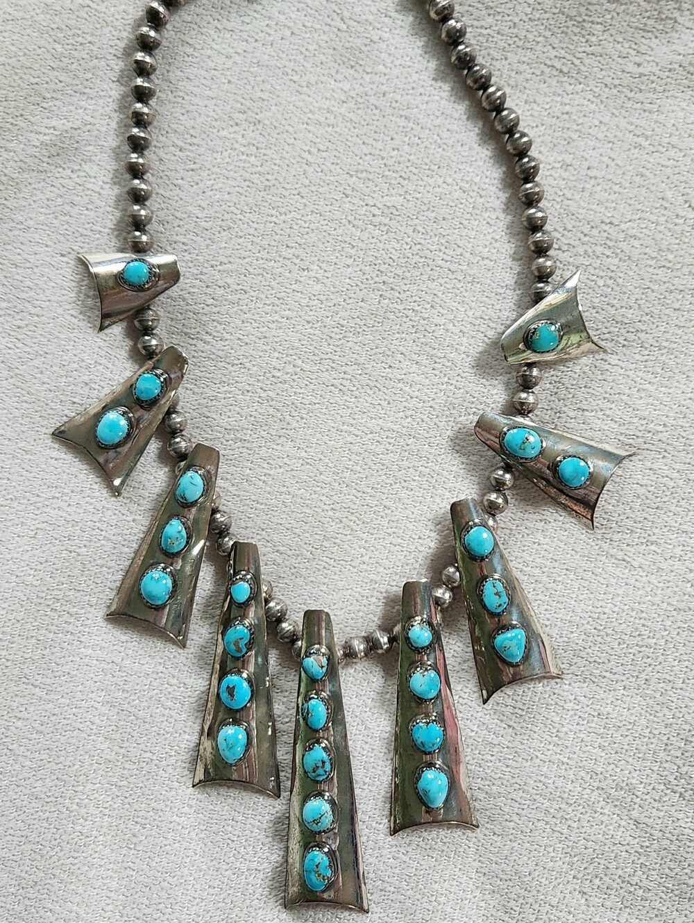 SIGNED ML NAVAJO STERLING SILVER AND TURQUOISE STATION NECKLACE